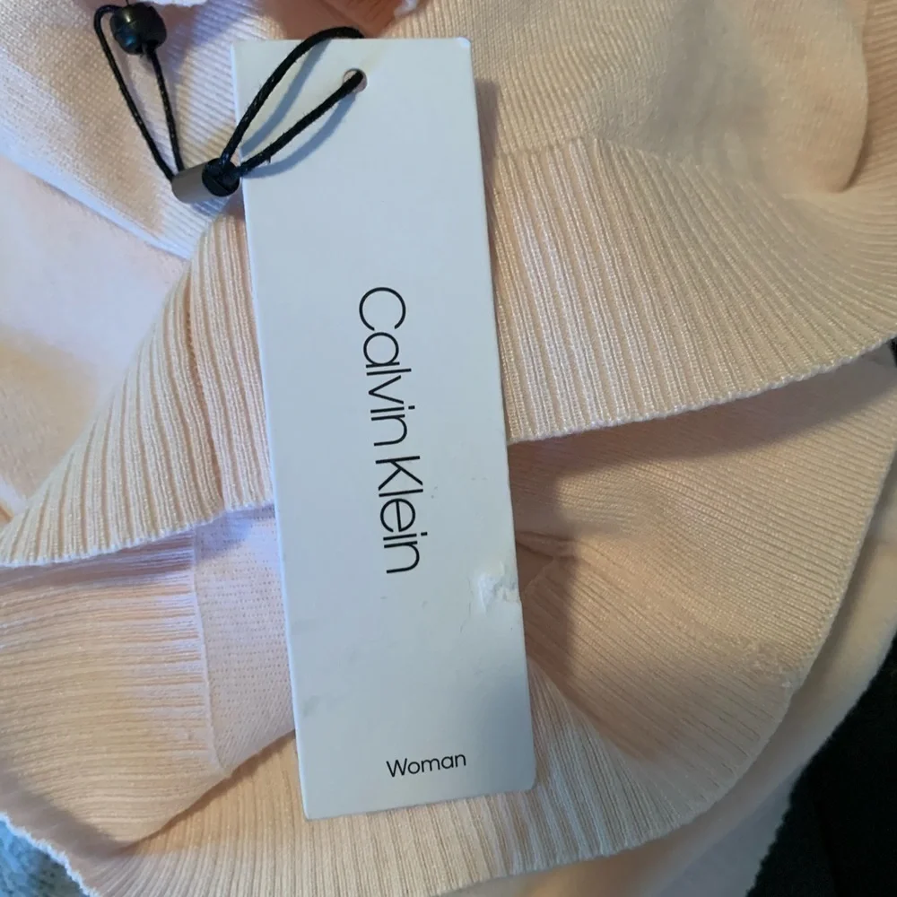 Calvin Klein NWT shrug light peach color